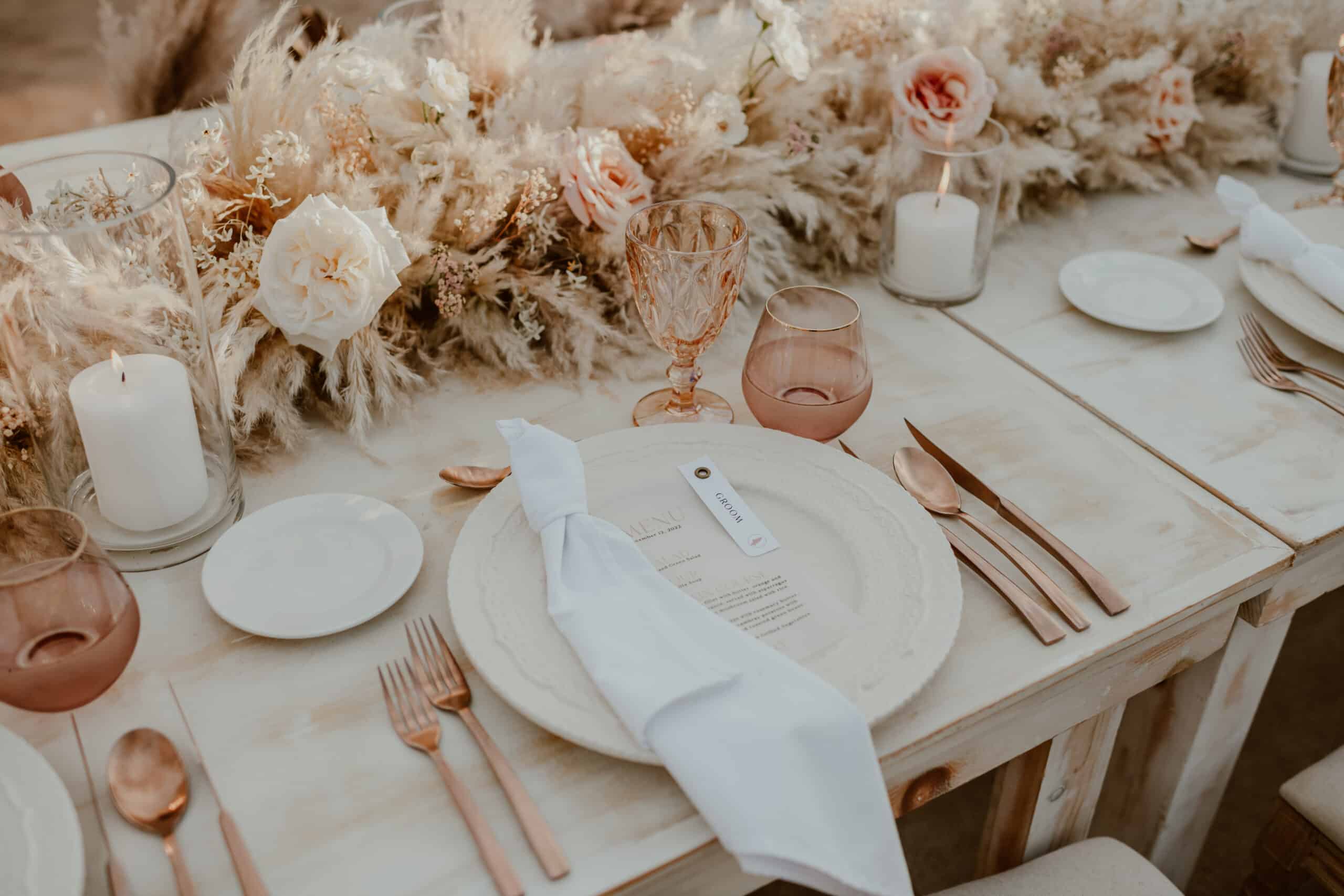 neutral wedding decor with touches of pink