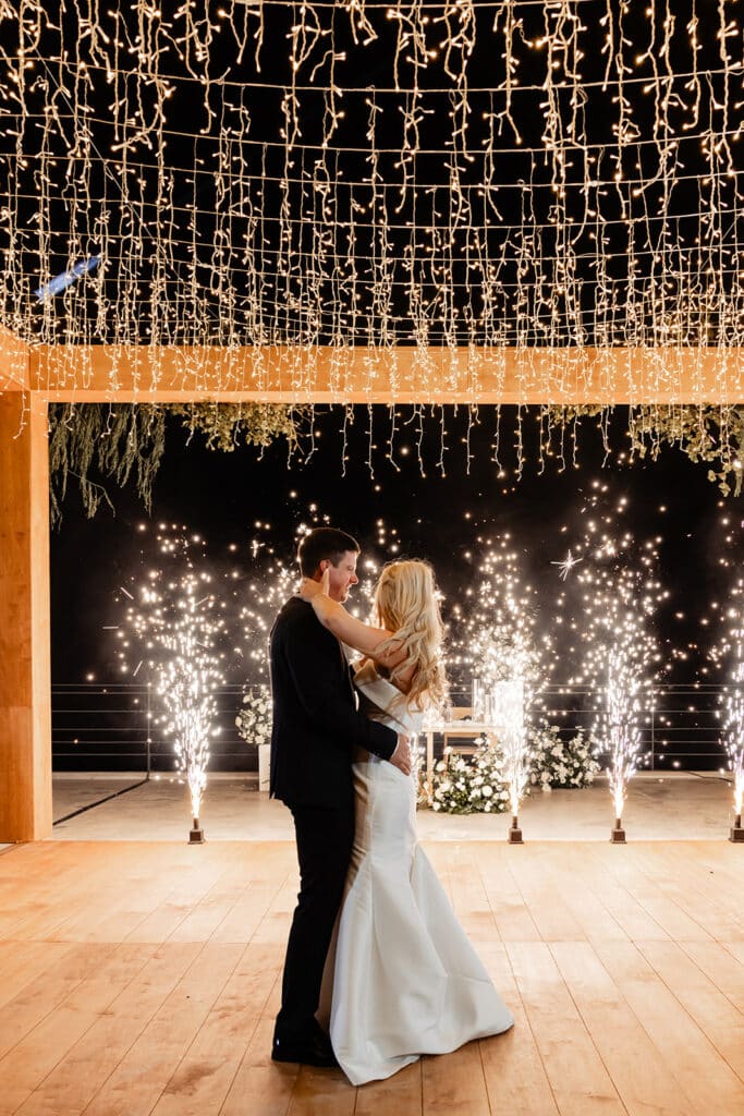 Cabo wedding at The Cape, a Thompson hotel in los cabos, México. Wedding reception lighting. beach black tie wedding. wedding decor. cabo wedding planner.